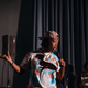 Gold Comedy instructor Elsa Waithe warms up the crowd.